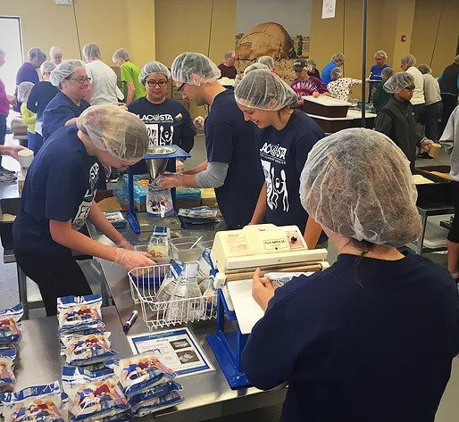 LACOSTA Employees at Feed My Starving Children in Libertyville, Illinois