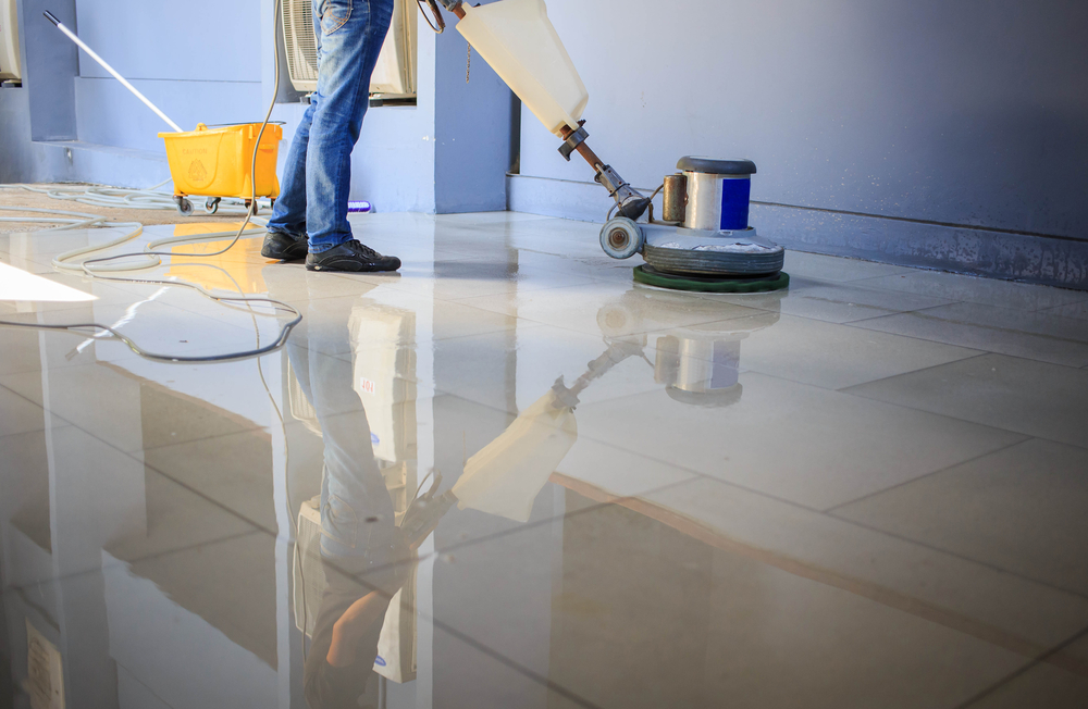 People cleaning the floor